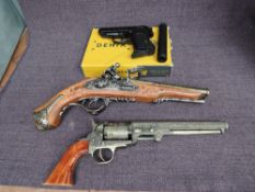 A Denix Replica Double Barrel Flintlock Pistol, a Denix Replica Walther PPK Automatic Pistol with