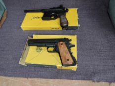 A Denix Replica 1896 German Mausser in box and a Denix Replica M1911A US Army Automatic Revolver