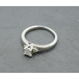 A diamond solitaire dress ring having a princess cut diamond, approx 0.4ct in a 4 claw mount to