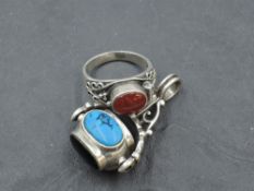 An HM silver spin fob having four oval non precious stone panels, and a silver Artisan style dress