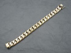 A lady's heavy flat curb link bracelet with concealed box clasp, approx 180mm long and 71.3g