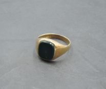 A gent's 9ct gold signet ring with bloodstone panel, size S & approx 4.5g