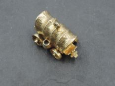 A 9ct gold charm in the form of an American station wagon, approx 9.7g