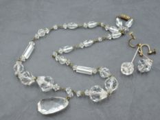 An attractive cut-crystal and gilt metal necklace and earring set, with graduating facet cut links