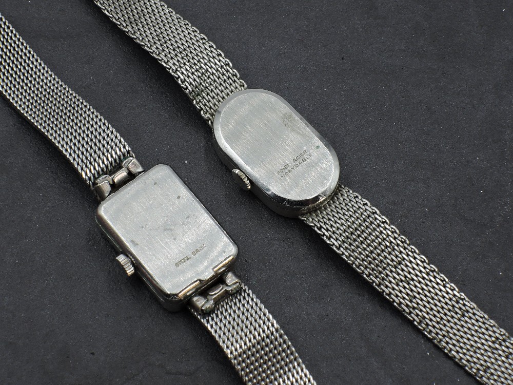 A lady's Omega De ville steel wrist watch having plain navy face in rectangular case on steel - Image 2 of 3