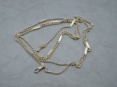 A rose gold fancy link muff chain with dog leash clasp, bearing plaque stamped 9C, approx 62' & 26.