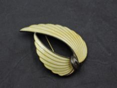 A Norwegian silver and yellow enamel brooch by Albert Scharning