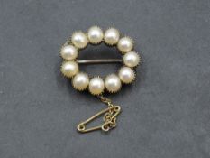 A Victorian split pearl and yellow metal brooch of petit oval form, no marks tests as gold