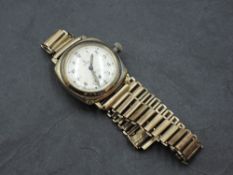 A 1930's 9ct gold cased Tudor (Rolex) gentleman's wristwatch, with Arabic hours enclosing the