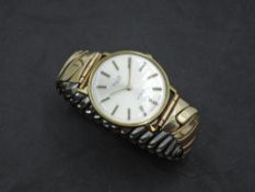 A gent's gold plated quartz wrist watch by Avia having baton numeral dial to champagne face in