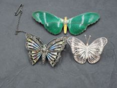 An 800 grade white metal butterfly brooch, with polychrome enamel and marcasite decoration, marked