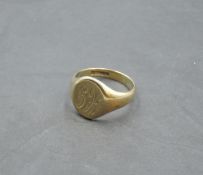 A gent's 9ct gold signet ring bearing monogram, size Q & approx 5.7g