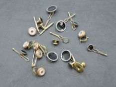 A 9ct gold shirt stud, marked 9ct, 1gram, sold along with a selection of yellow metal shirt studs/