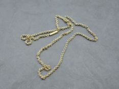 A yellow metal chain bearing plaque stamped 15ct and having barrel clasp, approx 18' & 5.5g