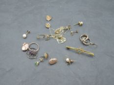 A small selection of yellow metal jewellery, many stamped 9ct including spider pendant, 'special