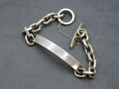 A Danish silver identity bracelet having ring and bar clasp, approx 48g