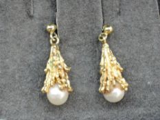 A pair of 9ct gold stud earrings having waterfall drops with cultured pearl terminals, approx 5.8g