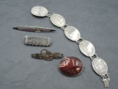 A small selection of HM silver and white metal jewellery including Charles Horner enamelled