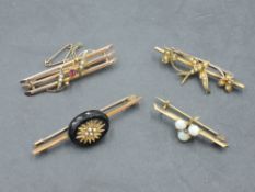 Four yellow metal bar brooches some marked 9ct/15ct of various forms including opal and seed