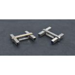 A cased pair of 9ct white gold and sapphire Art Deco style cufflinks of bar form, approx 7.4g