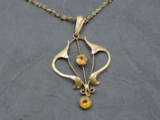 An Edwardian style pendant stamped 9ct on a yellow metal chain with barrel clasp, approx 3.7g