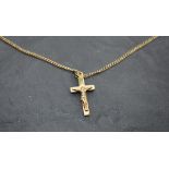 A 9ct gold crucifix pendant and chain, approx 22' & 5.2g