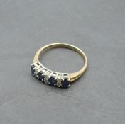 A sapphire and diamond half eternity ring on a 9ct gold loop, size Q & approx 2.2g