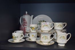 A selection of tea cups and saucers including Paragon Francesca and Wedgwood Golden Glory