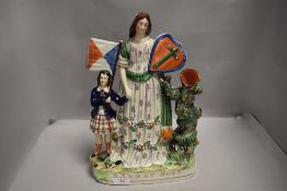 A Victorian Staffordshire flat back figure group titled Band of Hope