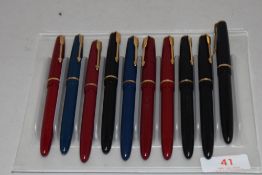 Ten Parker Slimfold fountain pens with decorative band to caps in various colours