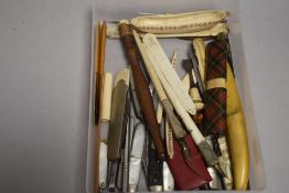A selection of pocket and pen knives including advertising and mother of pearl etc
