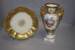 A mid Victorian porcelain mantle vase hand decorated with twin gilt dragon handles and a similar