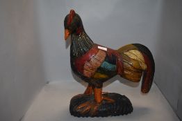 A life size modern wood carved figure of a cockerel