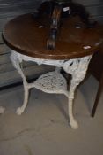 A traditional cast 'Britannia' pub table having wooden top