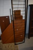 A selection of vintage teak ladderax parts