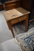 A 19th Century stripped pine side table having frieze drawer