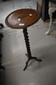 A 19th Century oak occasional wine table having barley twist column and triple splay legs, top