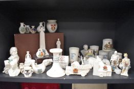 20th century Goss and similar crested wares including figures, motor car, bust and Bunyans cottage