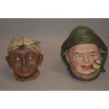 Ceramic lidded jars in the form of heads possibly by Bernard Bloch pottery