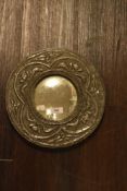 Victorian Arts and Crafts circular mirror having hammered pewter frame