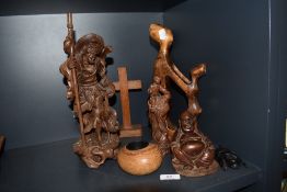 20th century Japanese wooden carved figures including seated Buddha man holding child and fisherman