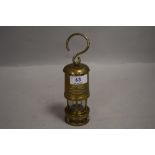 20th century miniature miners lamp bearing label for E Thomas & Williams