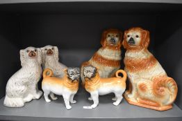 Victorian and later Staffordshire flat back dogs including mirrored pair of Bavarian Monkey face