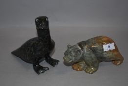 Stone carved animal figures including polar bear (signed M Lund to base of foot) and sea bird