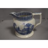Victorian large blue and white ware water jug having transfer print of Chinese city and boat