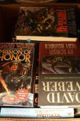 Library volumes and text books of csci fi and horror interest