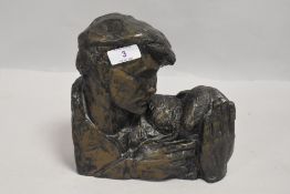 Resin study in a bronze effect depicting shepherd with lamb