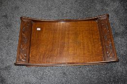 Victorian Arts and Crafts golden oak butlers tray having carved ivy leaf decoration