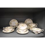 A set of eight Mintons 20th century soup cups and saucers in the Ancestral pattern