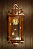 Edwardian Vienna style wall clock with stained wood case and enamel dial